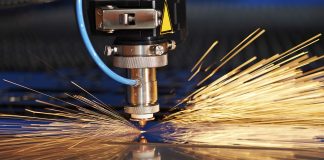 Laser cutting of metal sheet in tool shop