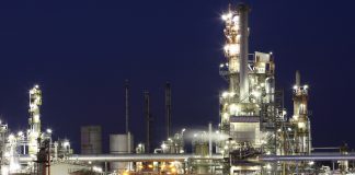 Chemical manufacturing plant at night