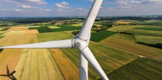 Wind turbine in farm field