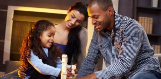 Parents and child building blocks