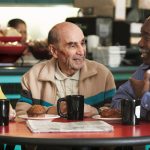 Senior citizens enjoying breakfast