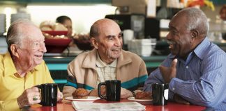 Senior citizens enjoying breakfast