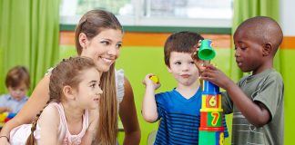 Kindergarten teacher with students