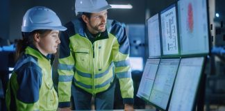 Engineers looking at SCADA