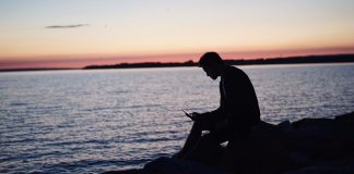 Sitting on the beach during sunset