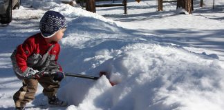 Child Shoveling Snow