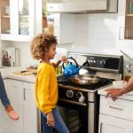 Family Preparing Food on Natural Gas Stove