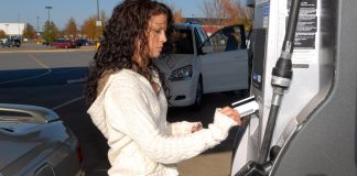 Woman Pumping Gas